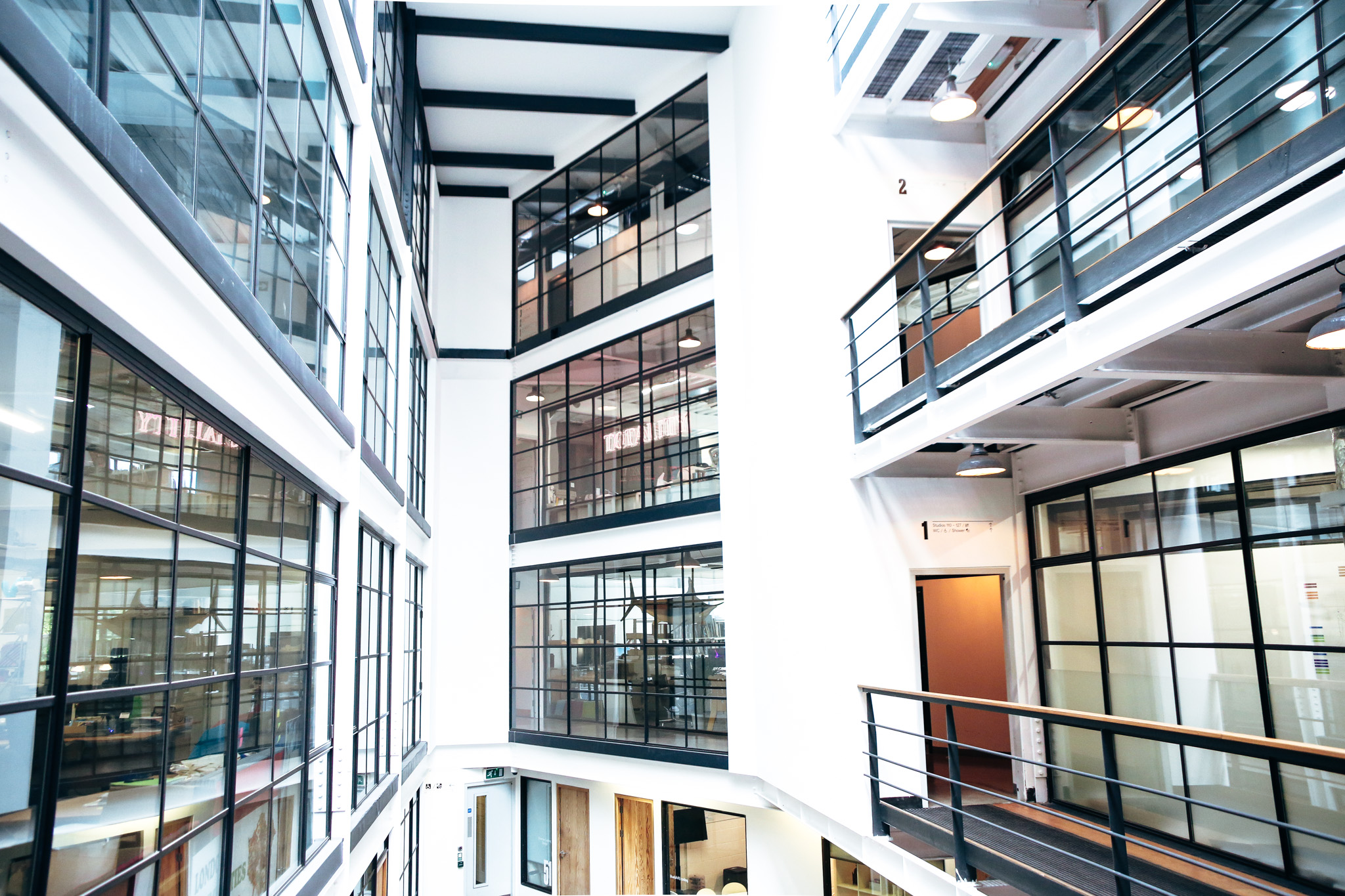Interior photo of the atrium in Great Western Studios, London by architecture photographer Alison Zak-Collins